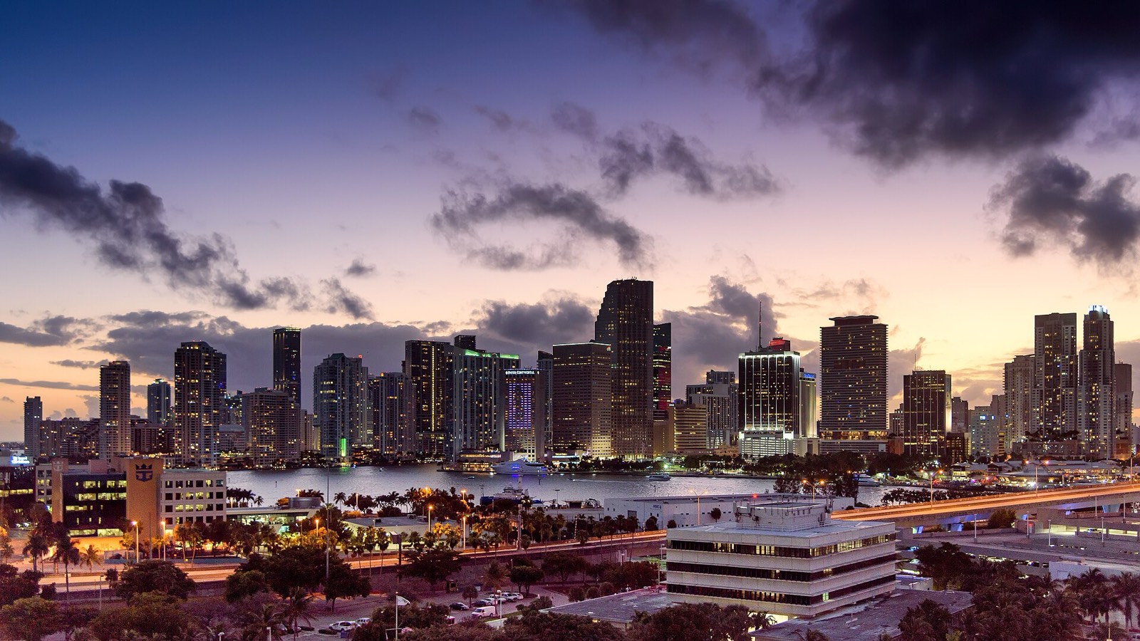 The Miami skyline at sunset, seen from a cruise terminal across the water